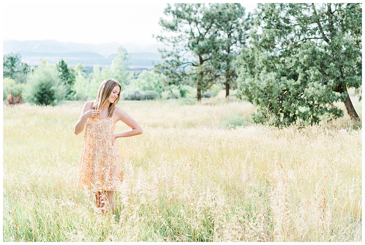 girl in field at highlands ranch mansion