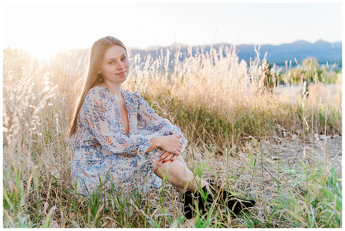 senior girl sitting in fields