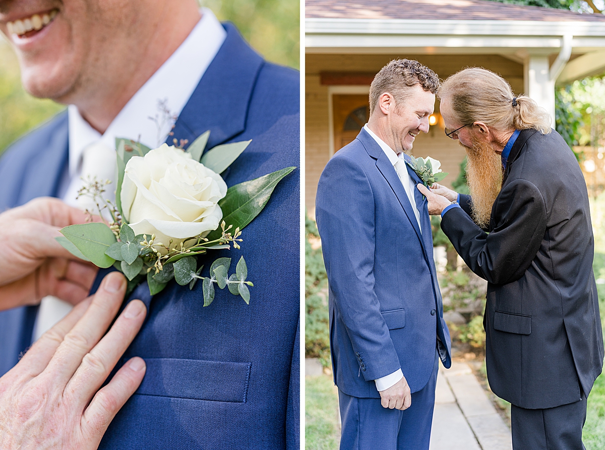 dad helping groom with boutonnière