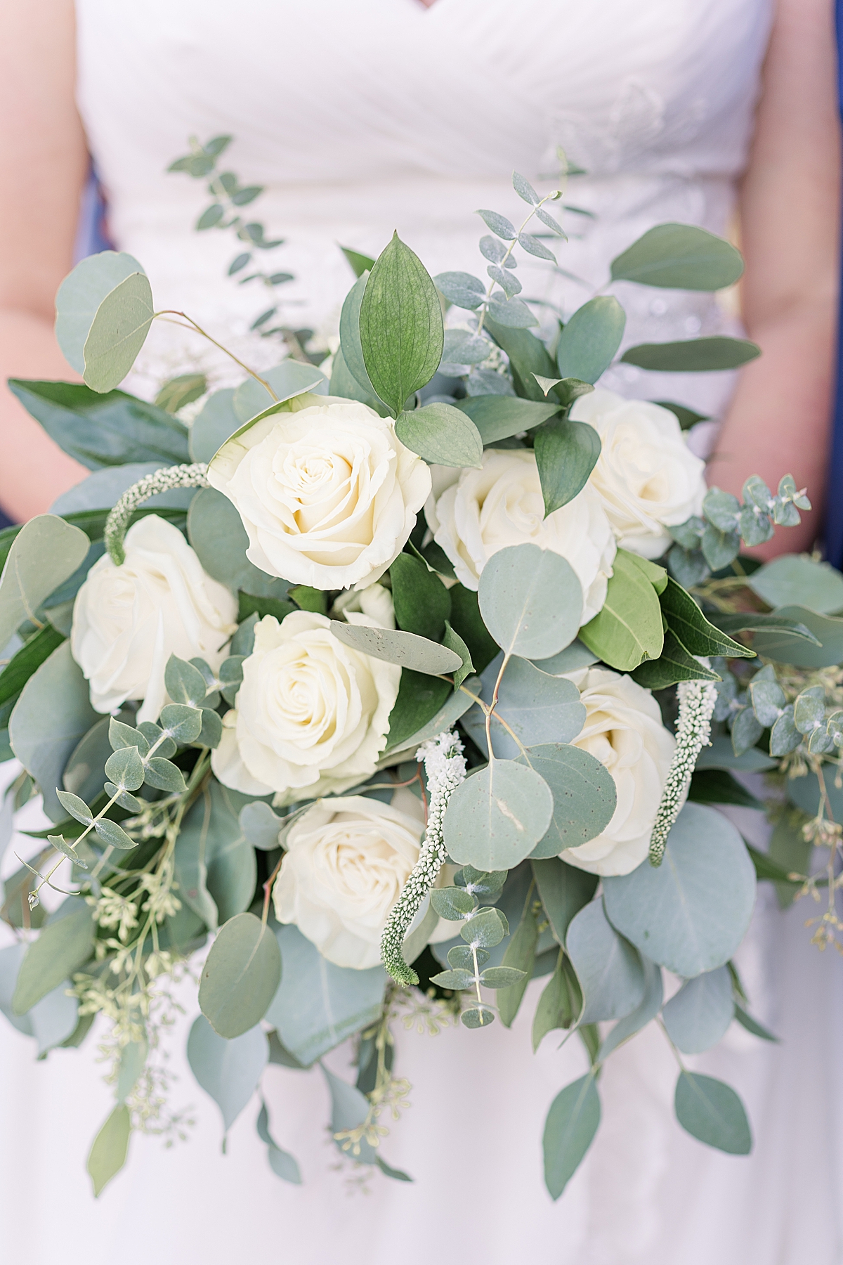 bridal bouquet with white roses and eucalyptus