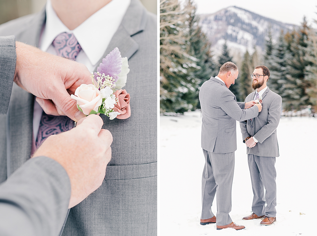 dad putting on groom's boutonniere