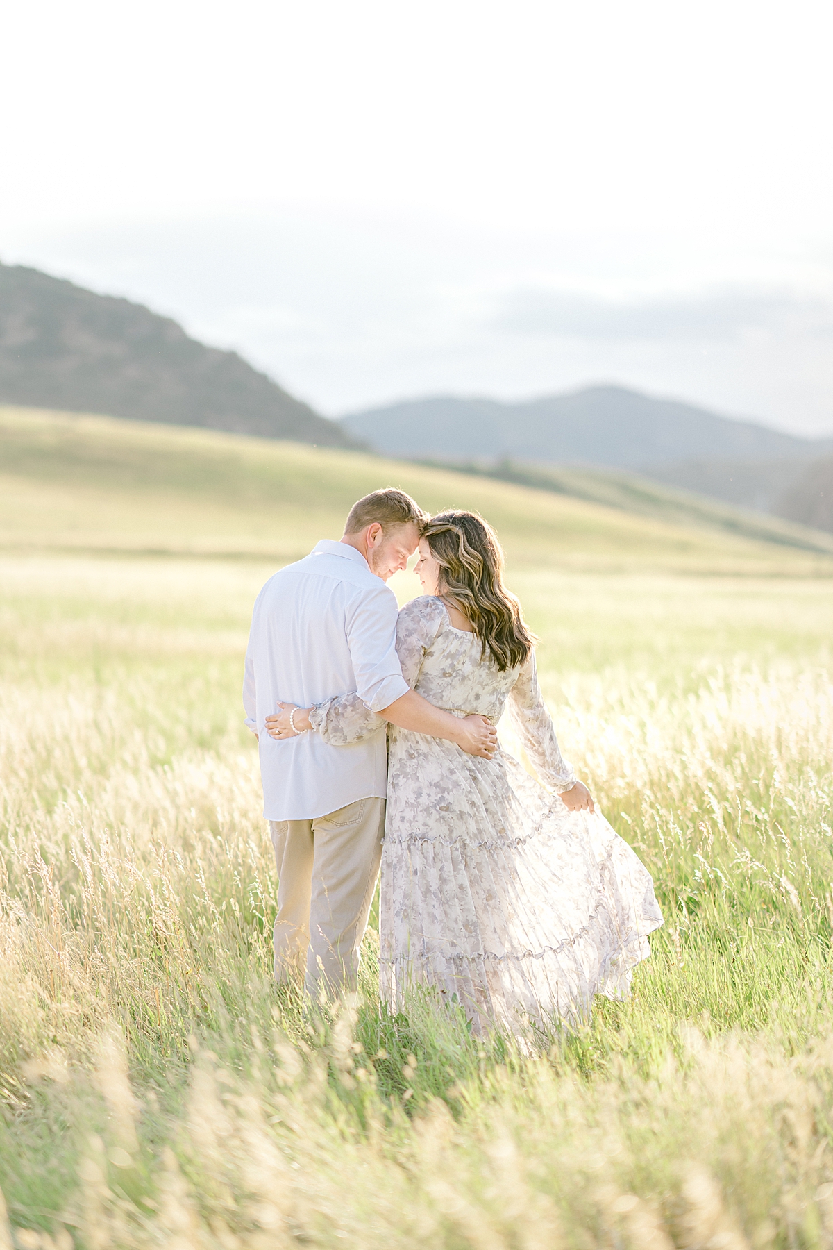 A couple hugs at Hildebrand Ranch for engagement photos.