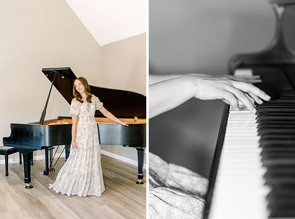 A girl in a long dress stands next to a grand piano and plays the piano.