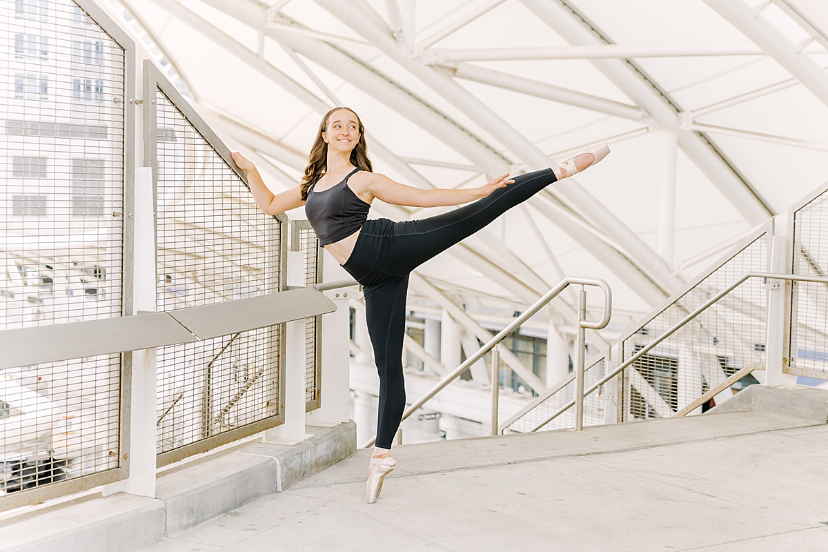 A ballet dancer poses in arabesque in Denver.