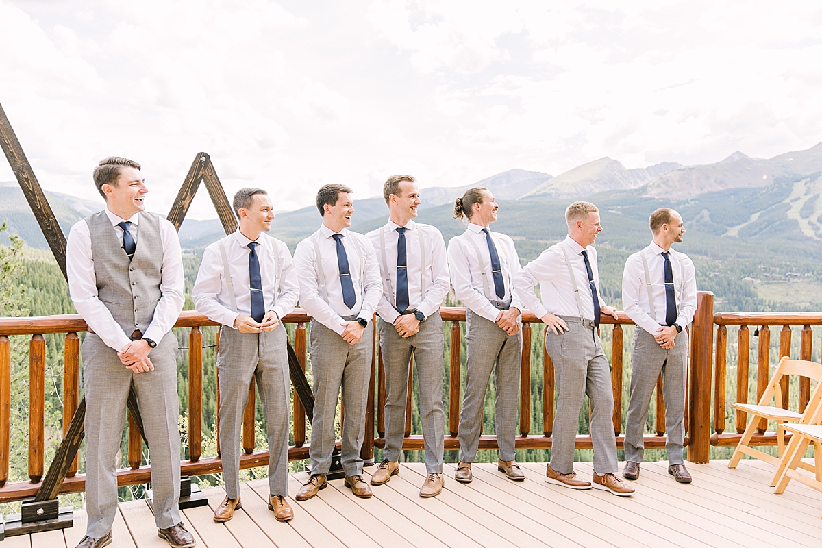 The groom and groomsmen watch the bride come down the aisle at The Lodge at Breckenridge.
