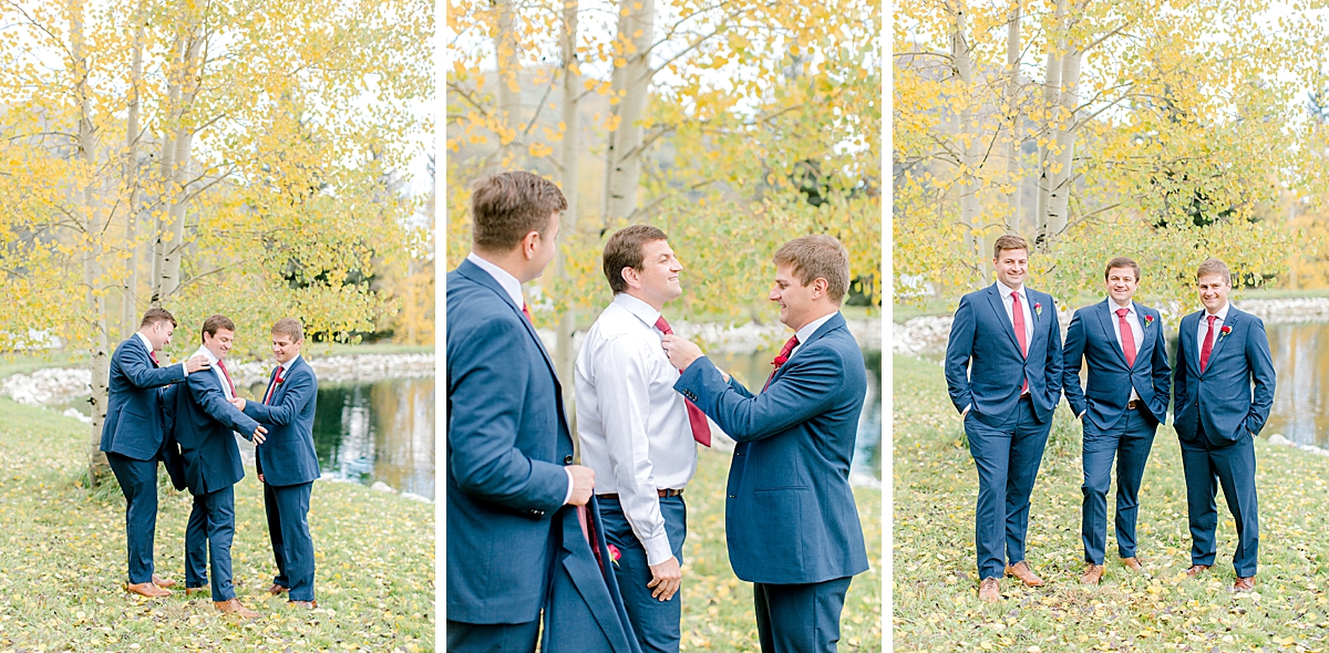 A groom gets ready for his wedding in the yellow aspens at Chair Mountain Ranch.