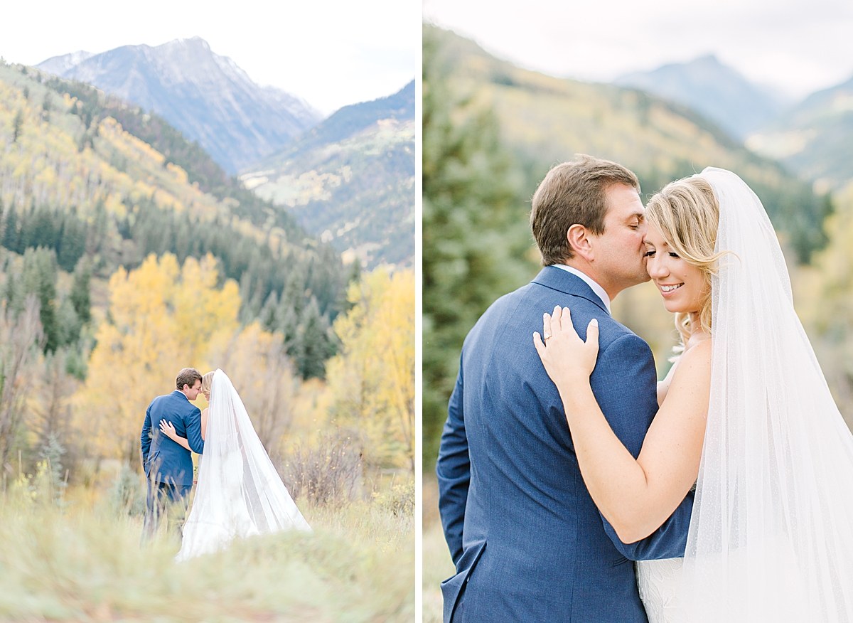 Bride and groom embrace in the fall foliage near Aspen, Colorado.