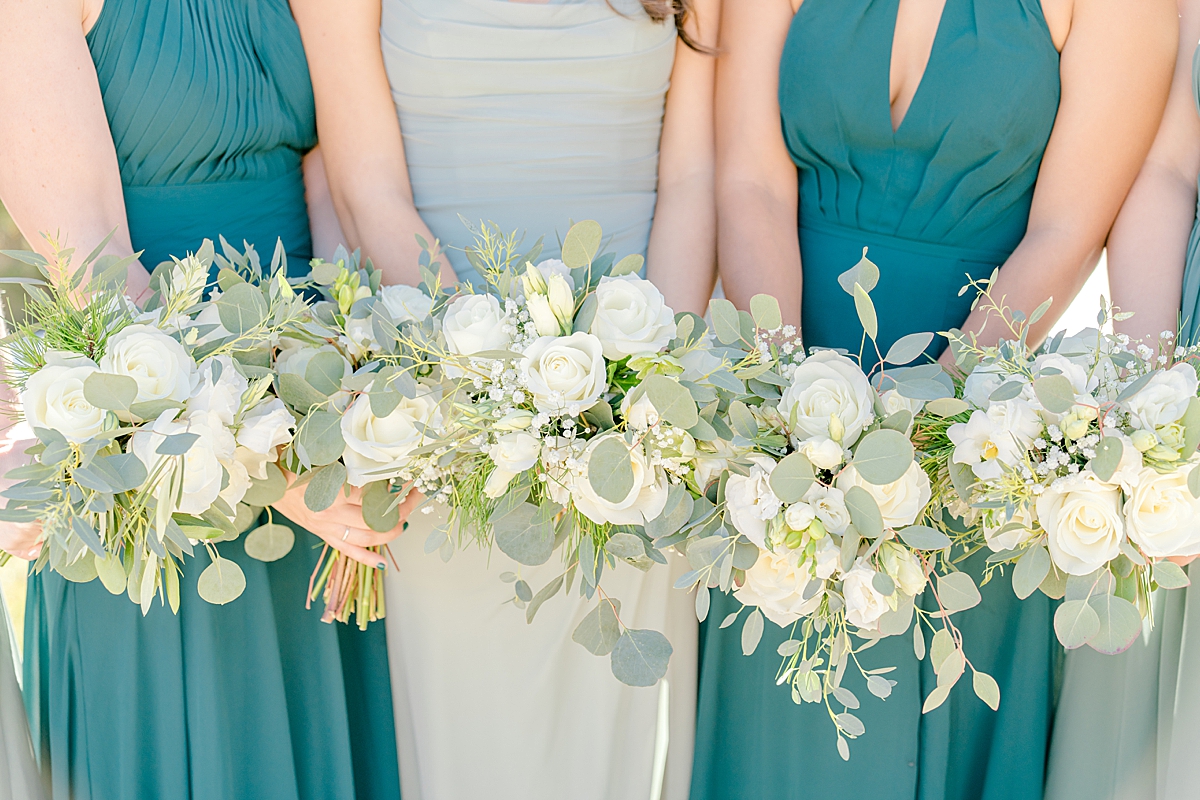 bridal bouquets and green bridesmaids dresses