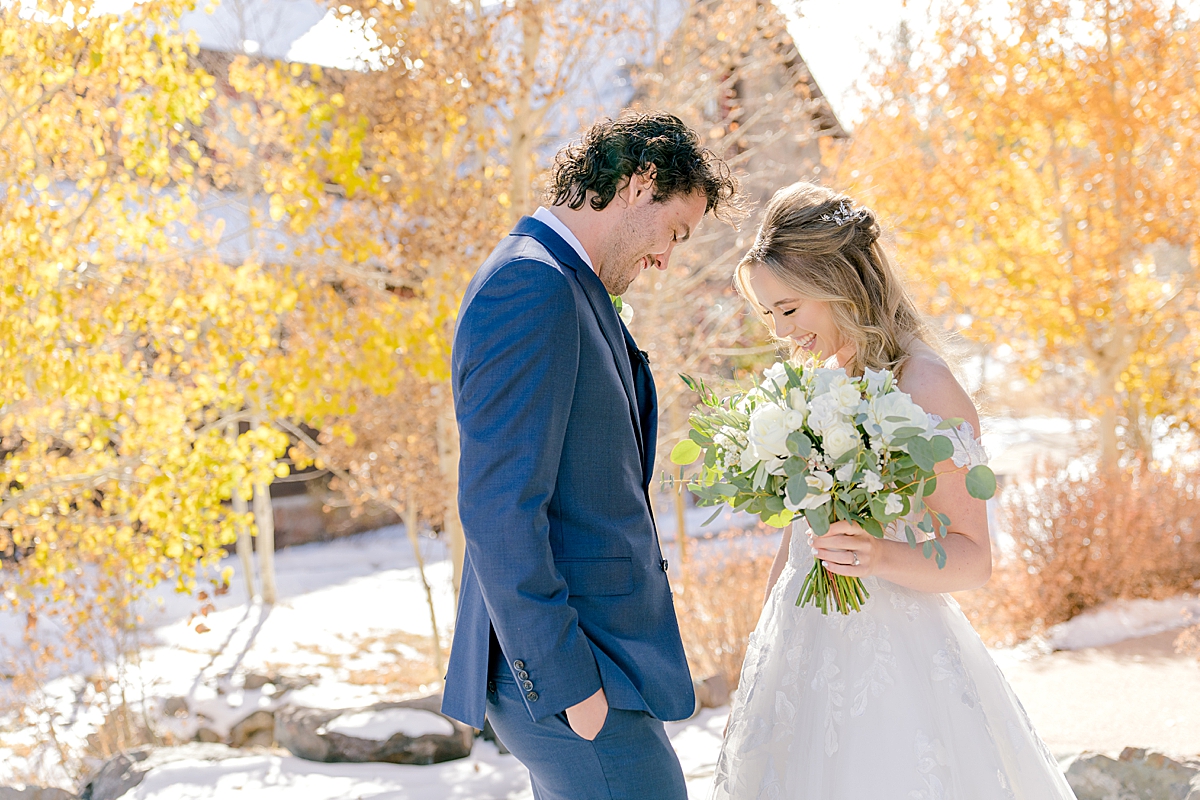 A fall wedding in Colorado with yellow aspen trees