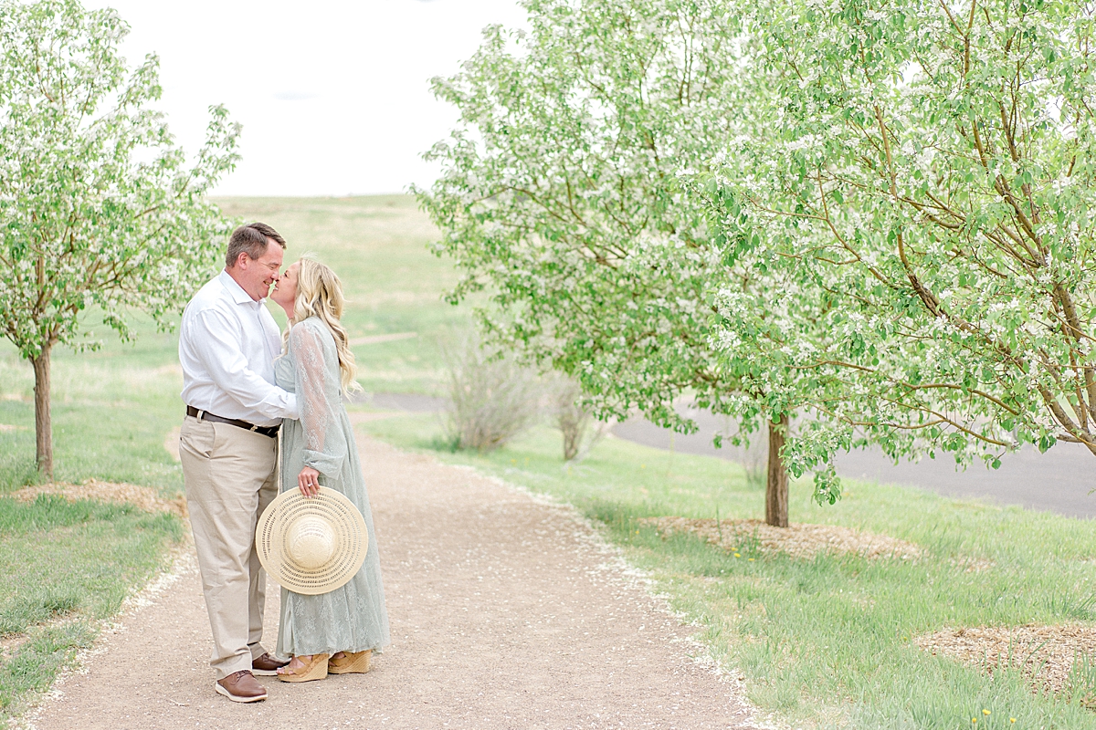 Highlands Ranch engagement photos on film in the spring blossoms