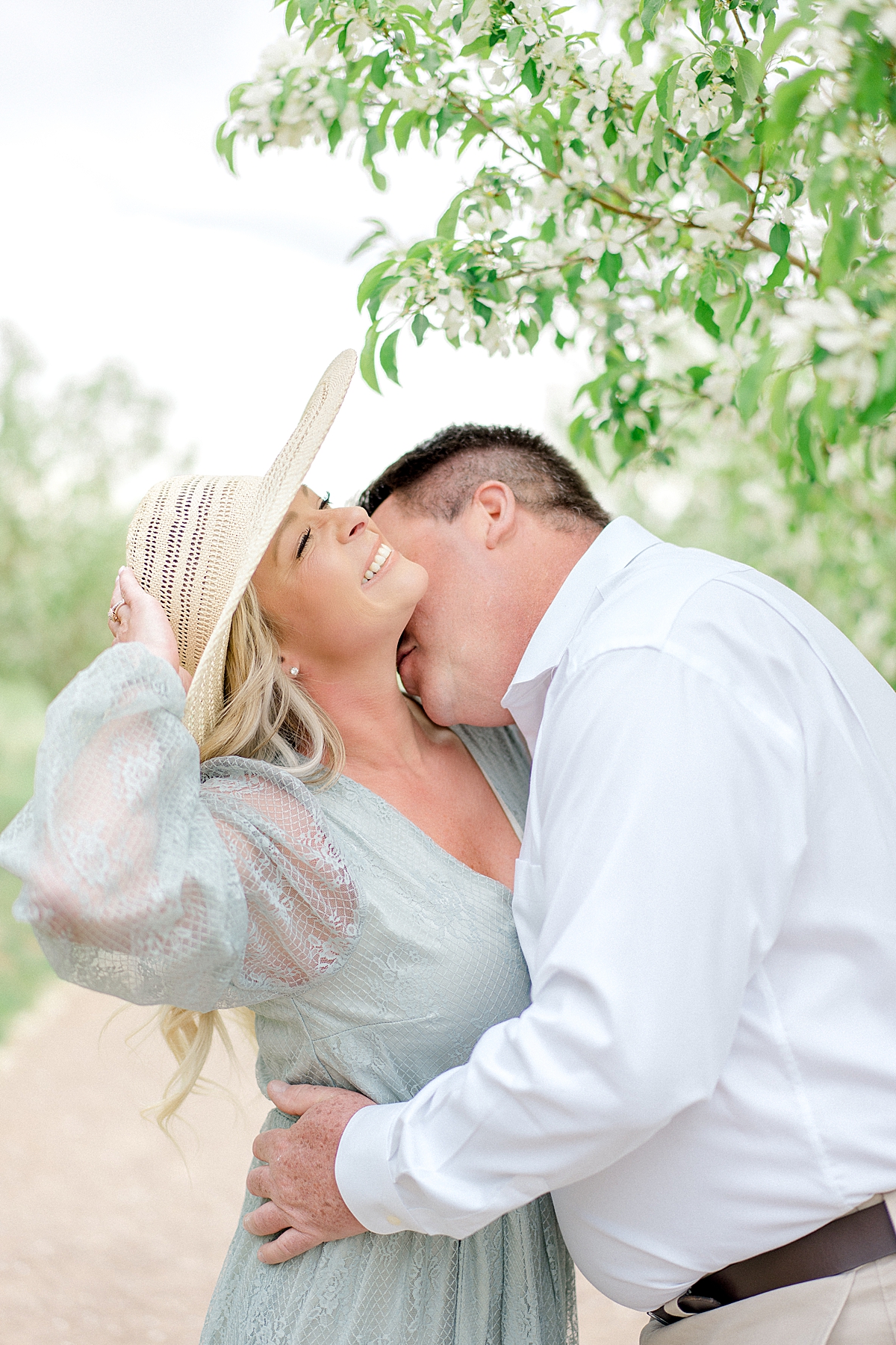 Highlands Ranch engagement photos on film in the spring blossoms