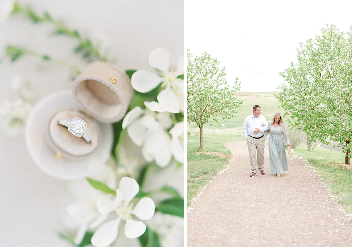 An engaged couple walks through the blossoms at the Highlands Ranch Mansion.