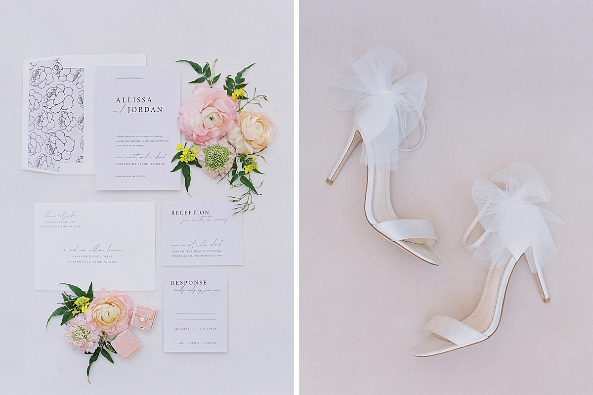 A wedding flatlay featuring an invitation suite, flowers, and Bella Belle wedding shoes.