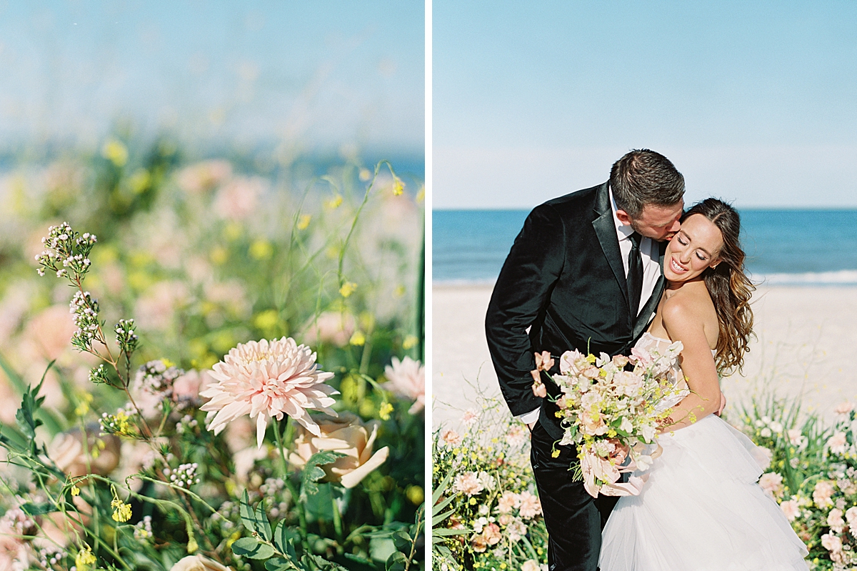 A groom kisses his bride on the beach in Florida for their modern beach destination wedding.