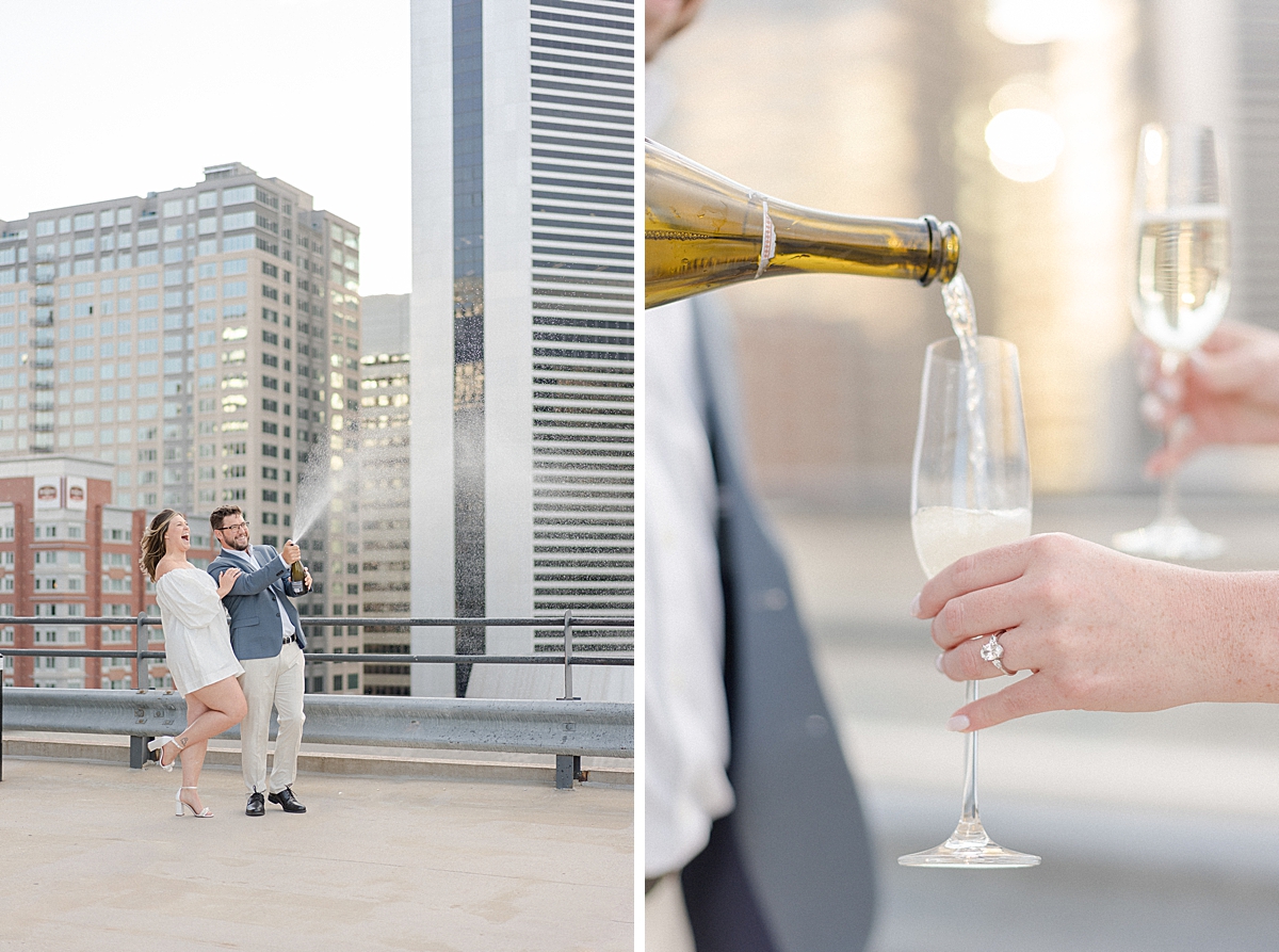 An couple pops champagne on a Denver rooftop to celebrate their engagement