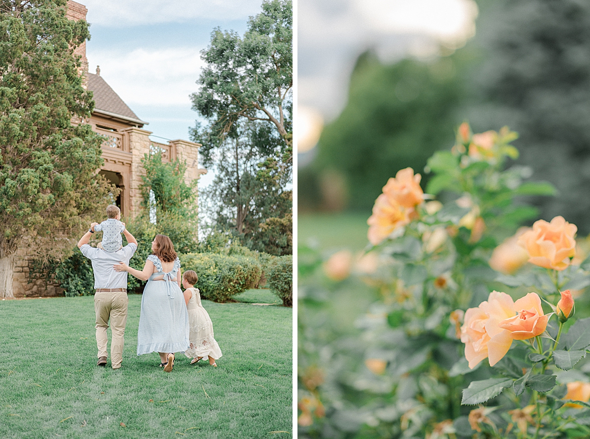 A family walks in the lawn an the Highlands Ranch Mansion, where orange roses bloom.