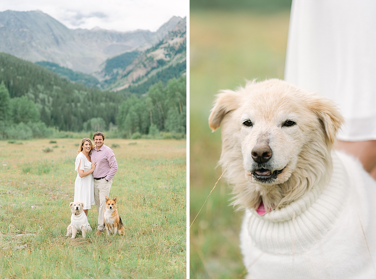 A couple smiles at the camera with their dogs during their Aspen colorado engagement photos in the Ashcroft valley.