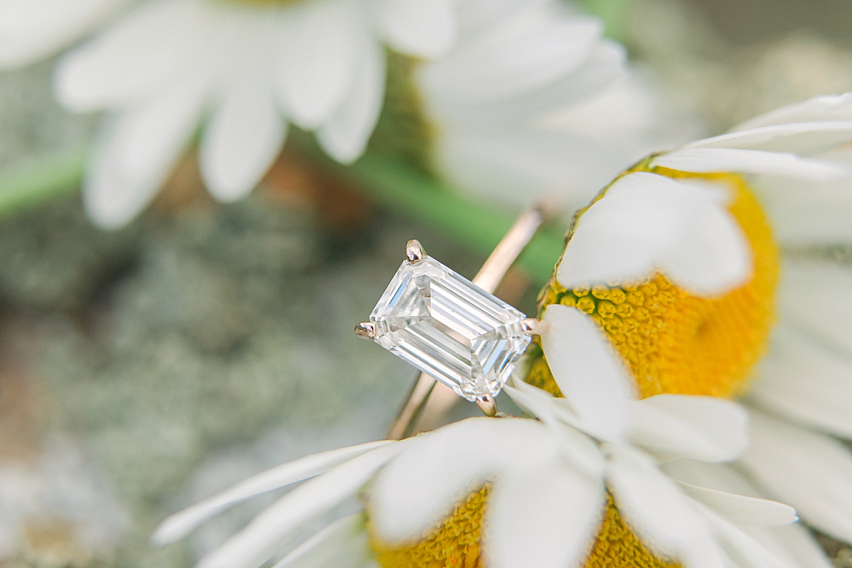 A gorgeous emerald cut diamond engagement ring.